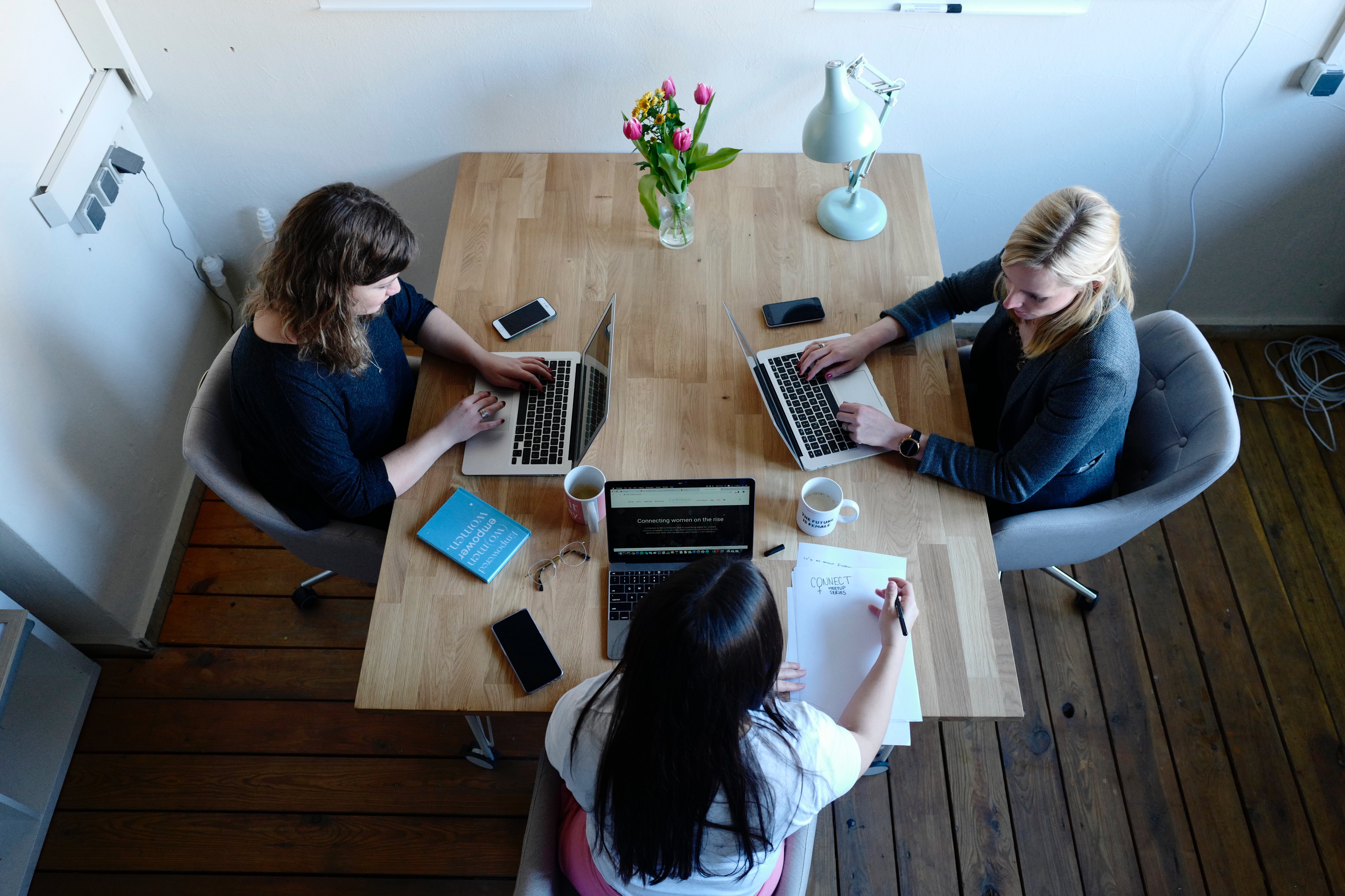 image of 3 women on laptop